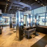 - Spa Bleü in West Dundee, St. Charles and South Barrington, IL Modern Aveda Salon interior with styling stations, mirrors, salon chairs, shelves with Aveda Color products, large windows, and exposed brick walls. - Spa Bleü in West Dundee, St. Charles and South Barrington, IL