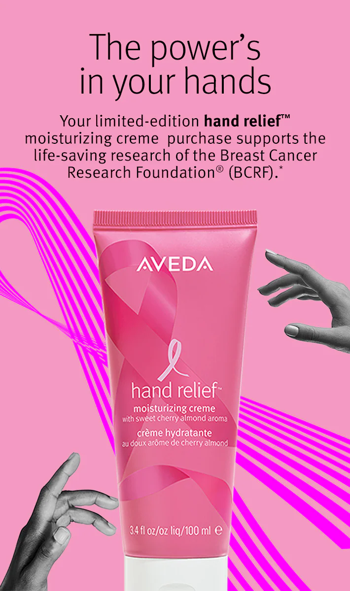 A pink tube of Aveda hand relief moisturizing creme is shown, promoting support for Breast Cancer Research Foundation with each purchase. Pink graphics and text are in the background.